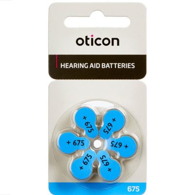 A package of Oticon 675 Battery hearing aid batteries contains six size 675 round blue batteries in a circular plastic holder with labeled backing.