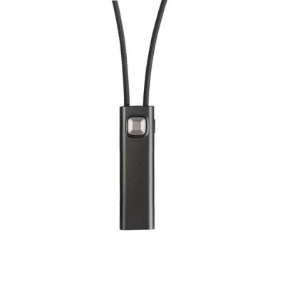 The Widex COM-DEX is a small, black, rectangular device with a square front button and a black cord, shown on a white background.