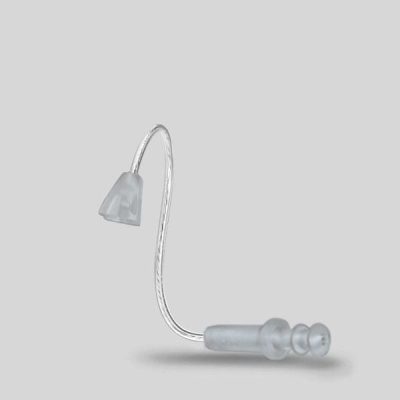 A LifeTube Refill hearing aid dome and thin tube with a soft silicone tip, displayed on a plain light gray background.