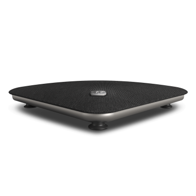A sleek, square black Widex TV Play speaker with rounded edges and small feet is shown on a plain white background. The top surface features a centered silver Widex TV Play logo.