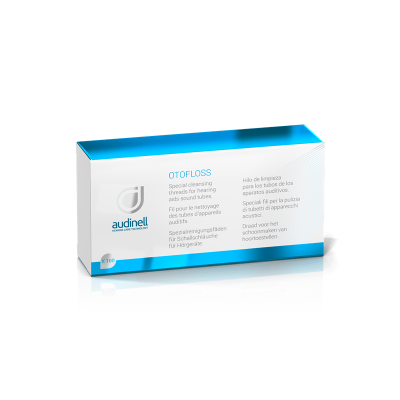A blue and white Otofloss box by audinell containing special cleaning threads for hearing aid sound tubes, with multilingual product information on the front.